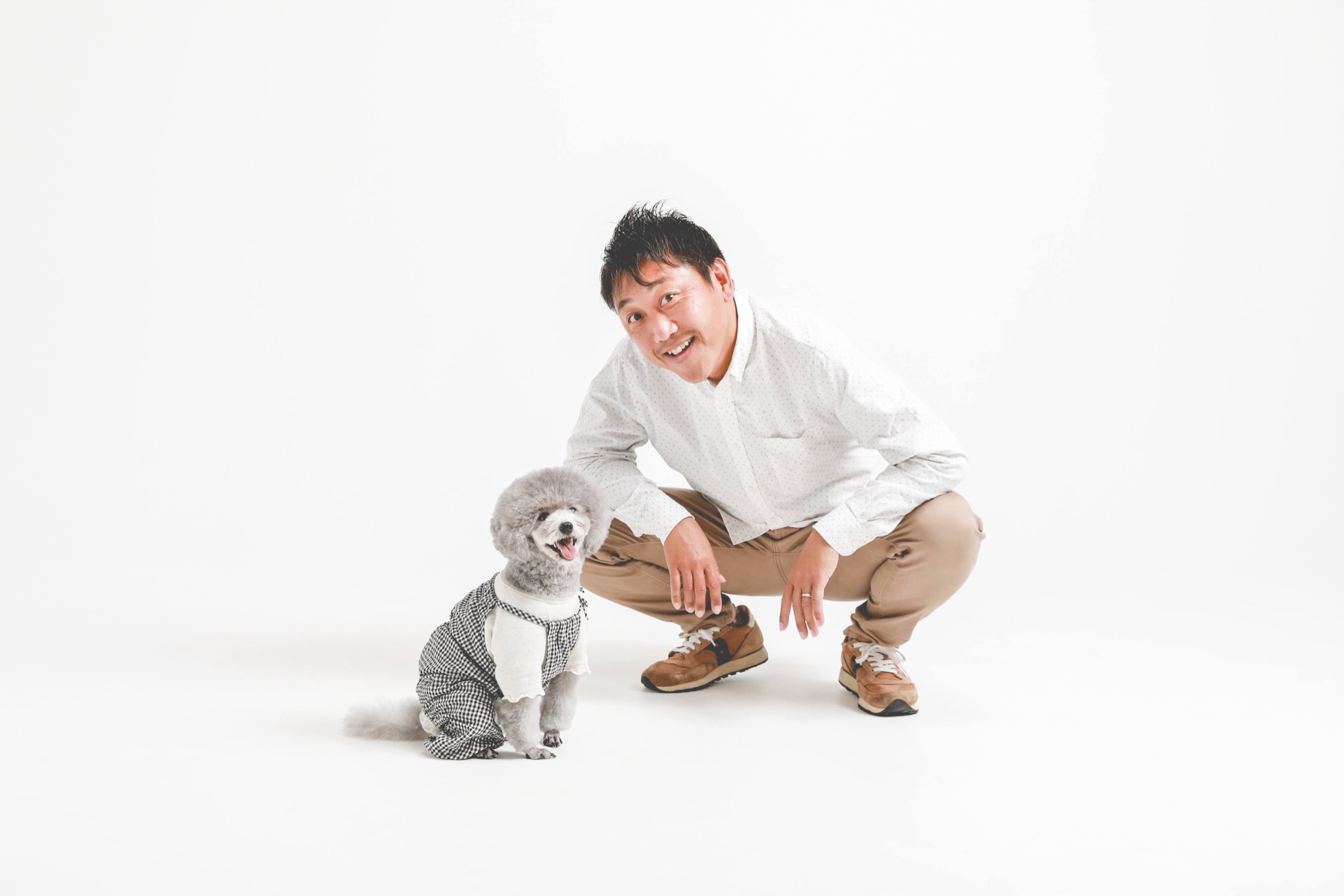 オーナーフォトグラファー藤岡徹と看板犬コロン